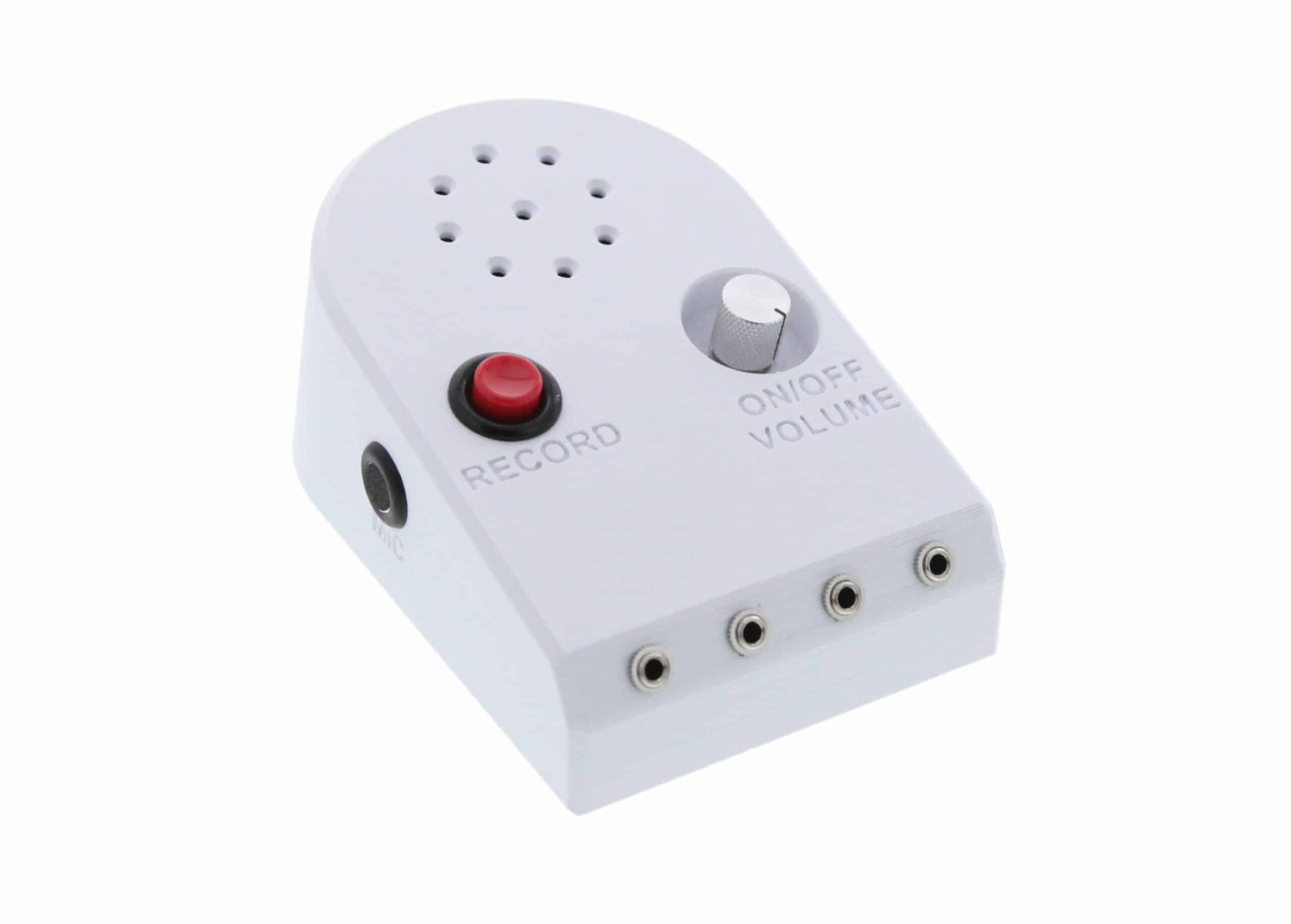 A small rectangular electronic module with four input jacks for connecting external switches and recording controls on top.