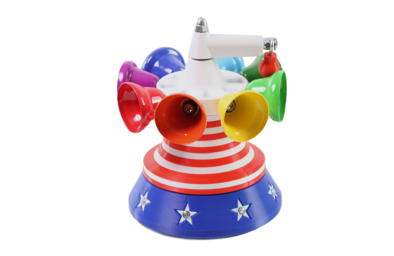 A ring of eight small colorful metal bells mounted around a central spinning base.