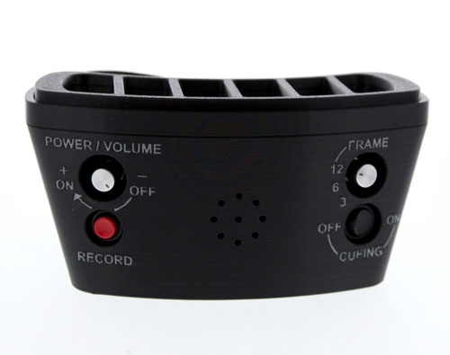 A compact wearable AAC communicator with a grid of message buttons in a snap-on frame and an adjustable waist strap.