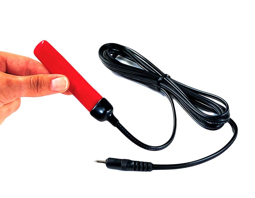 A small, slim handheld pinch switch with a cable, sized to be held between the fingers.