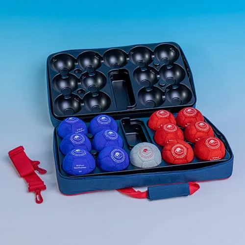 Open navy boccia case holding six blue and six red soft suede balls and one pale target ball, with a red strap.