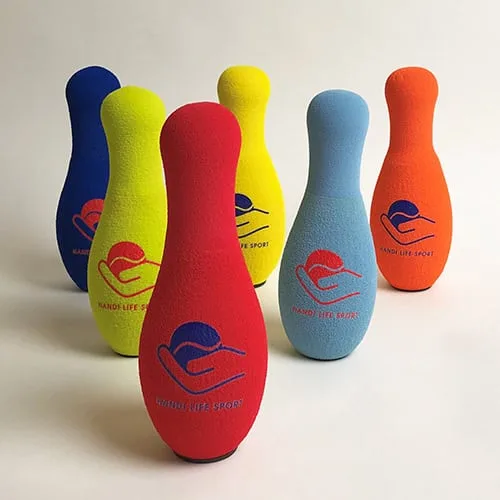 Six soft foam bowling skittles in blue, yellow, red, light blue and orange.
