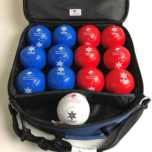 Open blue shoulder bag holding six blue and six red boccia balls upright, with a white target ball in front.
