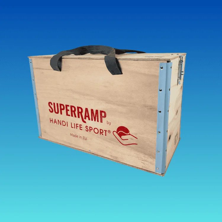 A wooden plywood box with a black carry handle, printed “SuperRamp by Handi Life Sport”.