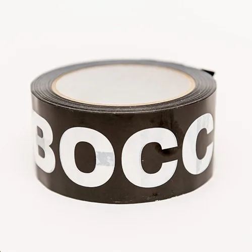 A roll of black boccia court tape printed with white “BOCCIA” lettering.