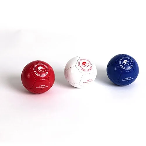 Three glossy Superior Shine boccia balls in red, white and blue.