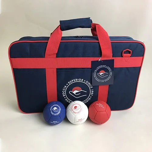 Closed navy Superior boccia case with red handle and shoulder strap, three boccia balls in front.