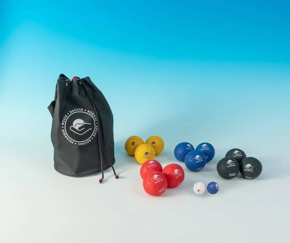 A black drawstring bag with soft petanque balls in yellow, blue, red and black and two target balls.