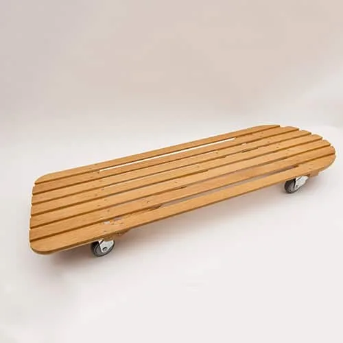 A wooden slatted roller board on small castor wheels.