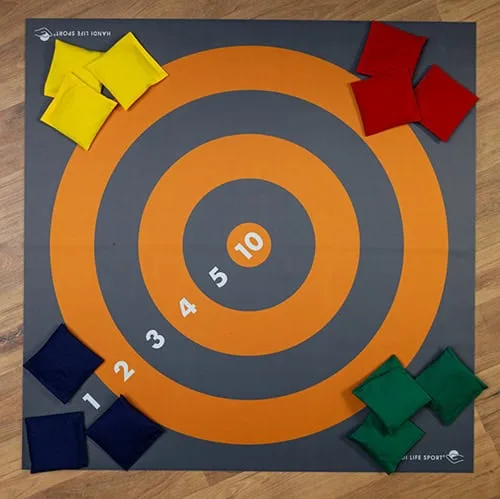 A target mat with orange rings numbered 1 to 10, with bean bags in four colours at the corners.