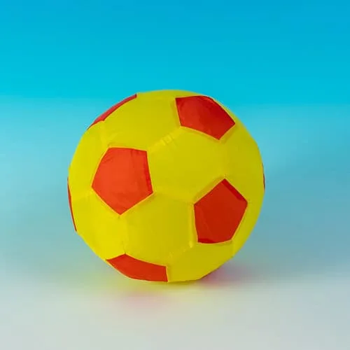 A light yellow and orange fabric-covered balloon ball.