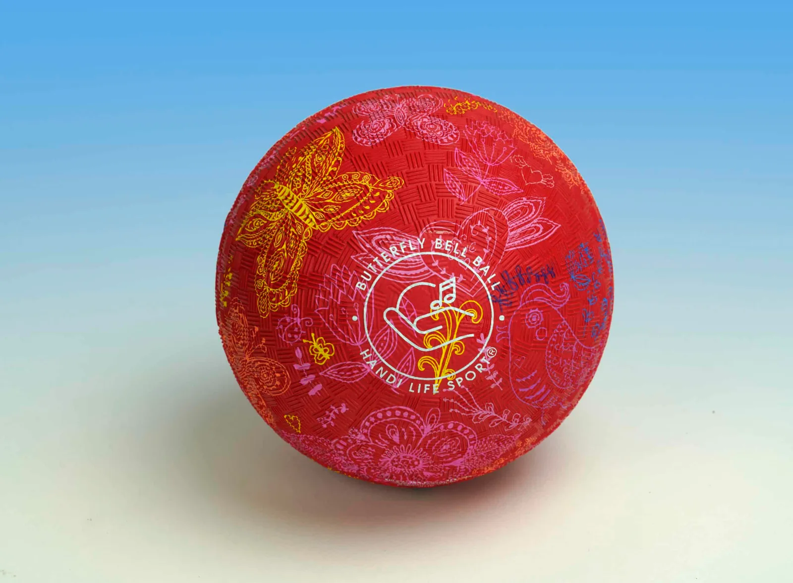 A small red ball with yellow butterfly and floral patterns marked “Butterfly Bell Ball”.