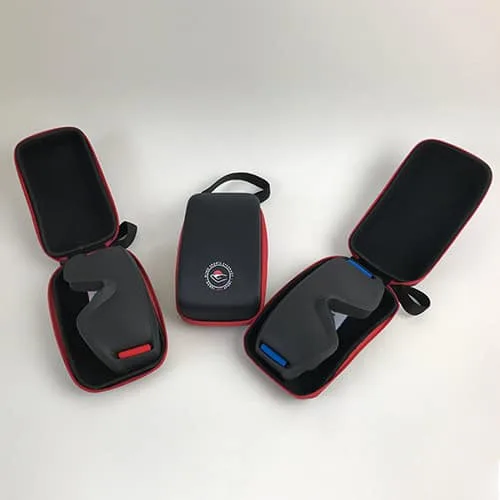Open black-and-red cases each holding a grey moulded blind-sports mask.