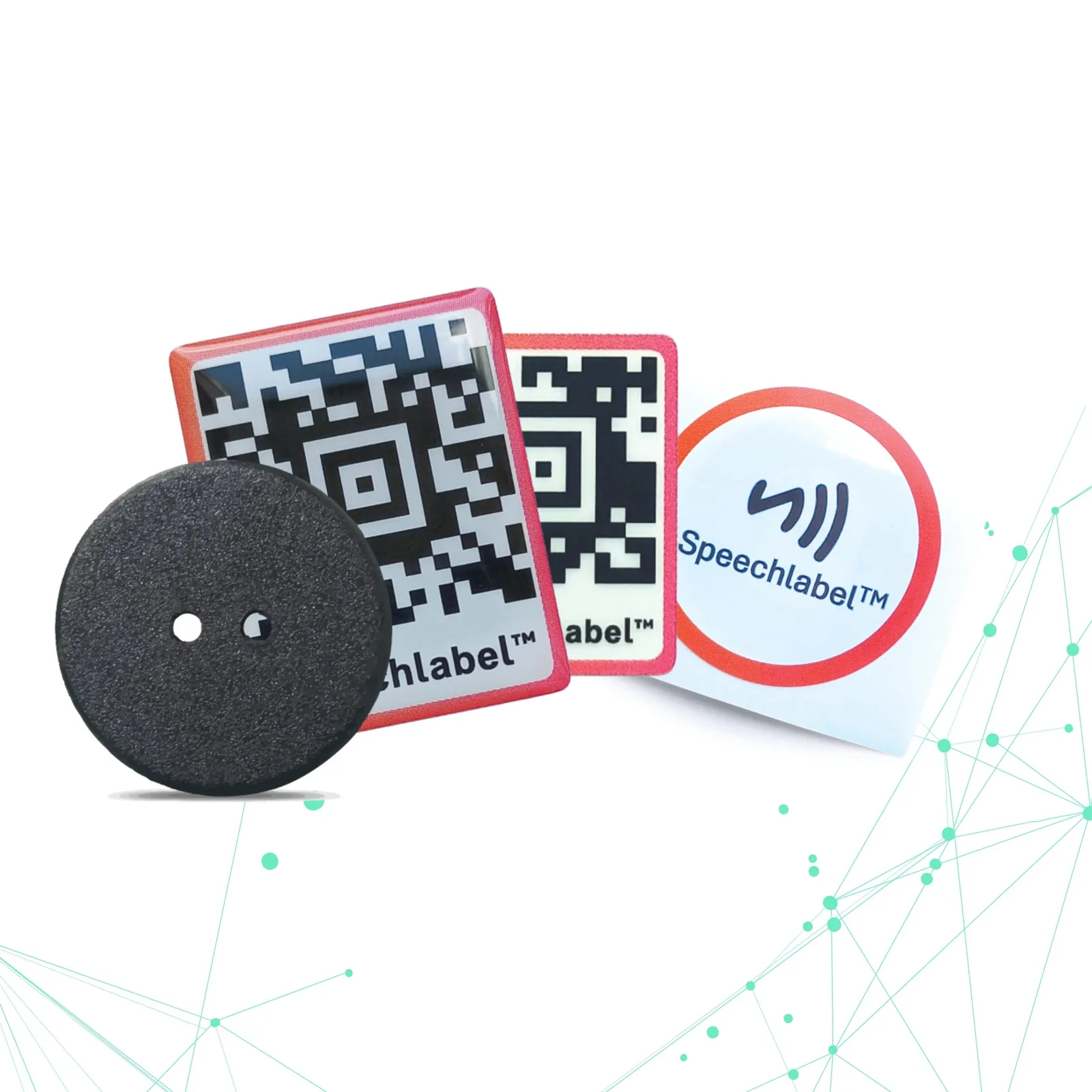 An assortment of Speechlabel label types grouped together: a round black NFC laundry button, a thick QR code sticker, a thin QR code sticker and a round NFC touch sticker with the contactless symbol.