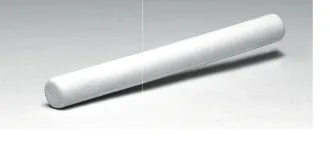 A plain white rubber baton with rounded ends, lying at an angle on a grey background.